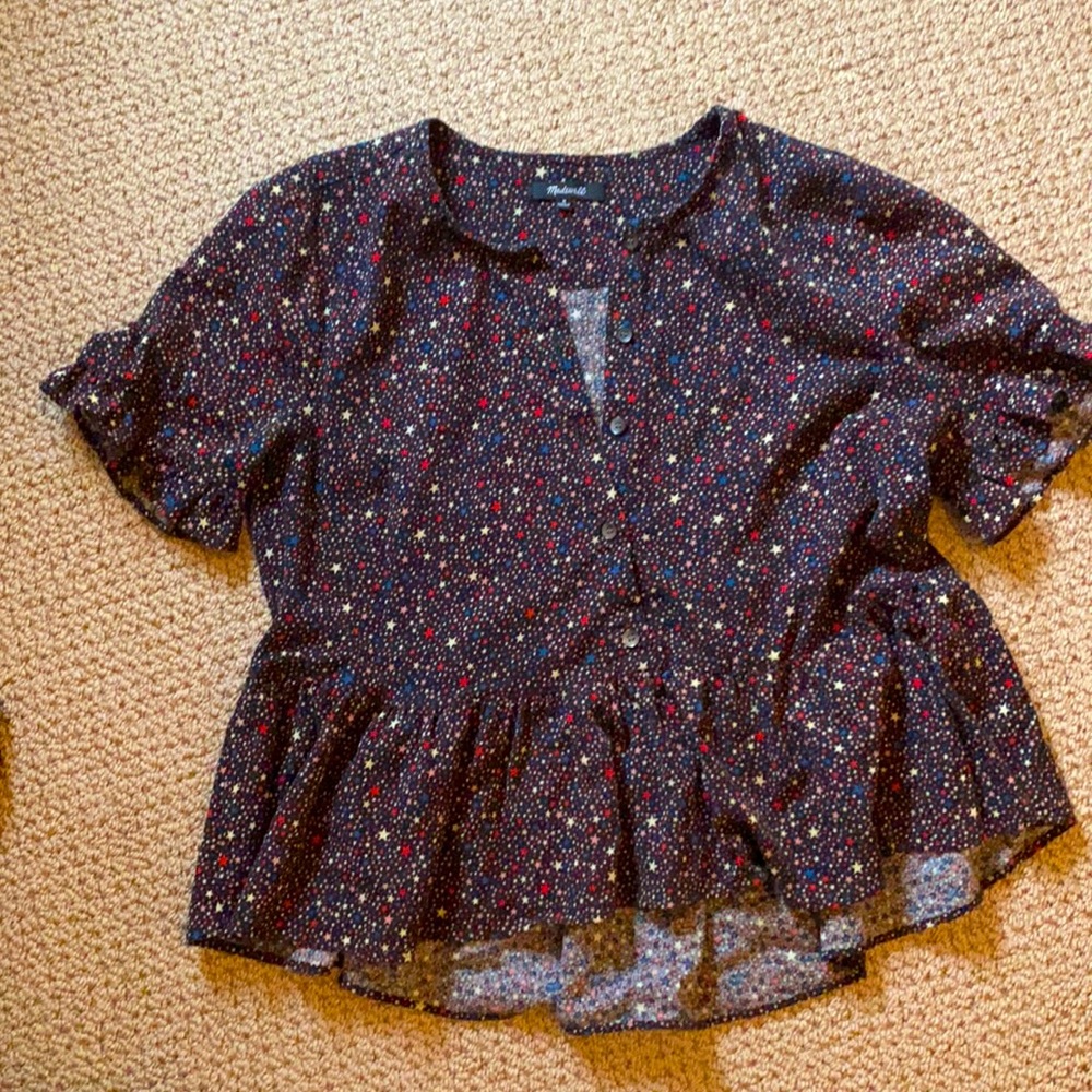Madewell black peplum top with multicolor stars